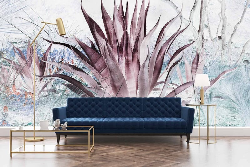 The large, artistic mural features vibrant purple and blue agave plants. This stunning backdrop combines deep hues of purple and blue, enhancing the ambiance with its botanical theme.