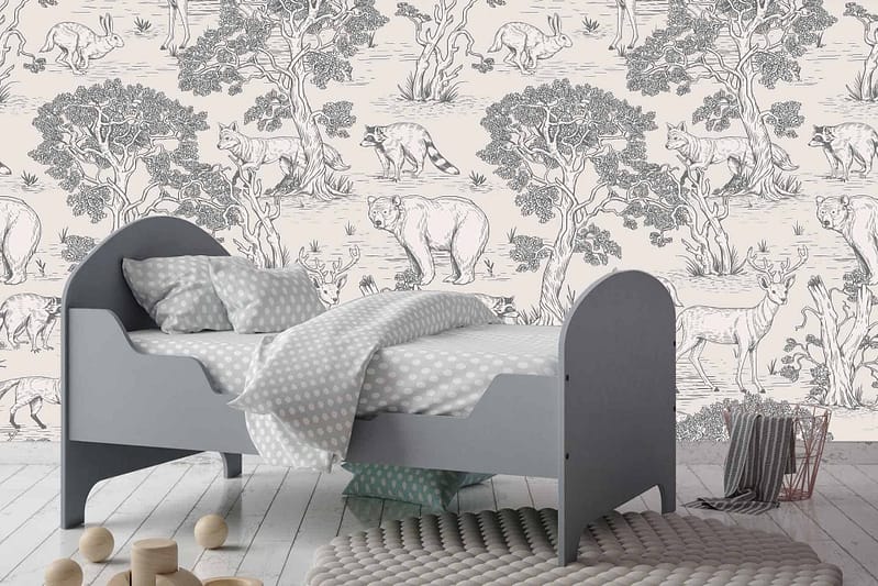 Patterned wallpaper with detailed illustrations of various animals, including lions, deer, and birds prowling among trees. Monochromatic color scheme in shades of gray and white.