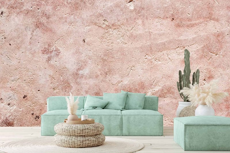 The wallpaper is a large, textured pink wall.
