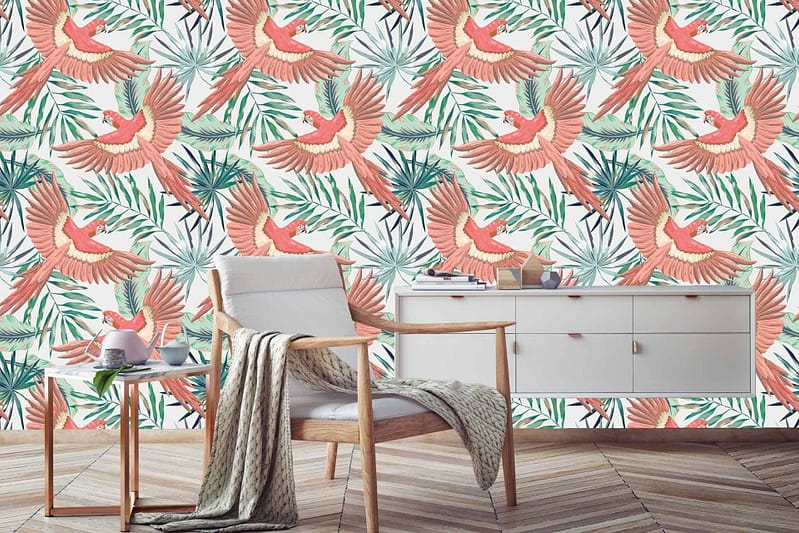 Vibrant wallpaper with red birds and tropical foliage.