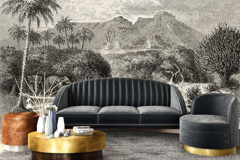 The wallpaper features a detailed black and white landscape mural with intricate mountains and trees, creating a striking visual focal point.