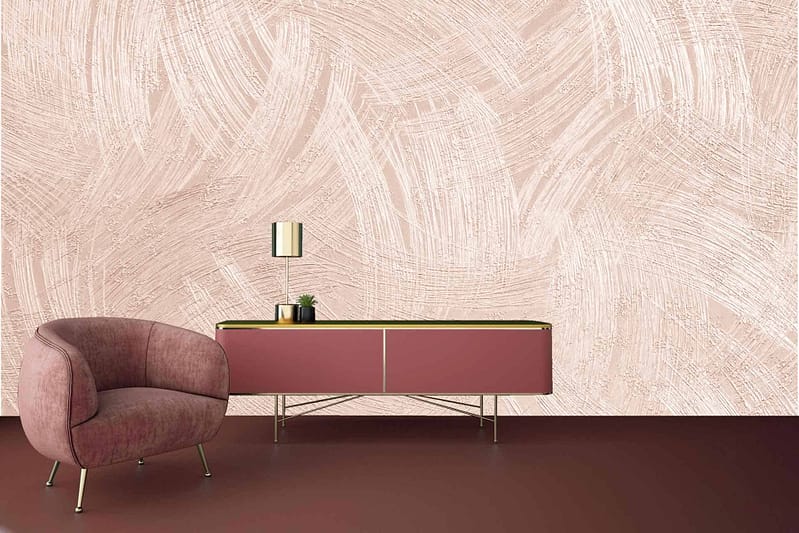 The wallpaper is textured and light pink, adding a contemporary touch to the space.