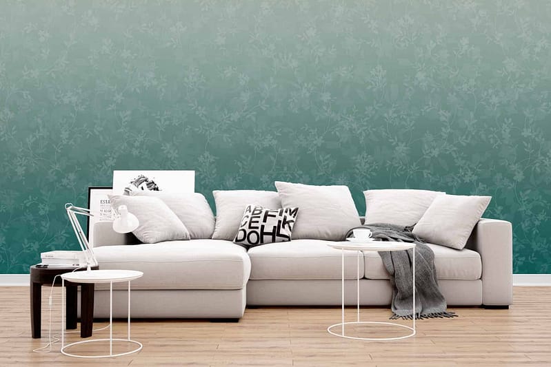 Elegant teal floral-patterned wallpaper featuring delicate flower and leaf motifs.