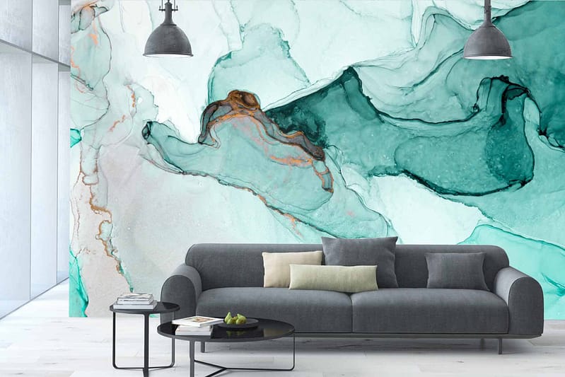 The large wall mural behind the sofa features an abstract design with vibrant shades of teal, white, and brown. The swirling patterns and dynamic shapes create a striking visual centerpiece in the living room setup. Teal brings a refreshing pop of color while the brown adds warmth, and white balances it all for a modern yet inviting atmosphere.