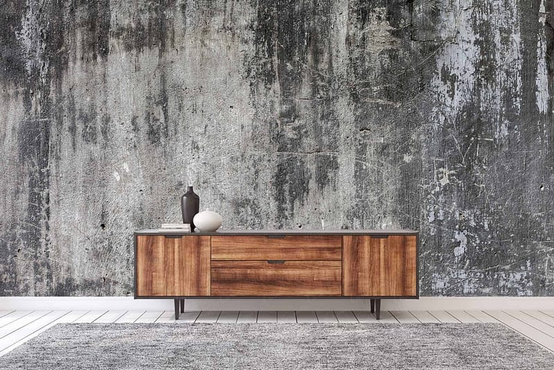 Abstract and textured wall in gray and black tones, reminiscent of an artful Side Street.