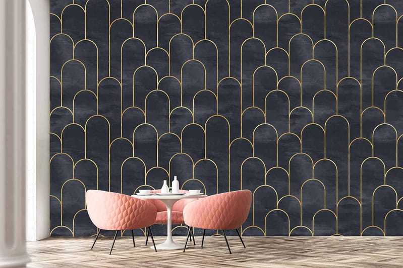 A stylish room features a striking dark wall adorned with a modern gold arch pattern. The wallpaper blends deep, rich hues with sleek, metallic gold accents forming graceful arches.