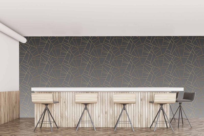Dark wall with gold geometric patterns