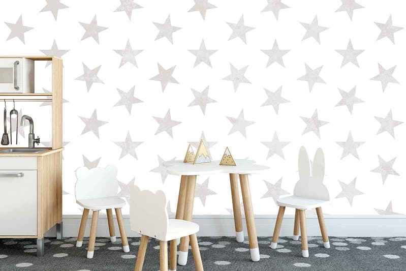 The playroom features white walls decorated with a grey star pattern. The wallpaper highlights include white background, grey stars, and a subtle repeating star design.