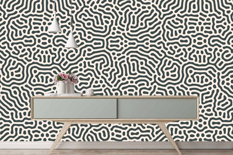 The wallpaper is an intricate black and white abstract pattern, featuring complex, interwoven shapes and lines.