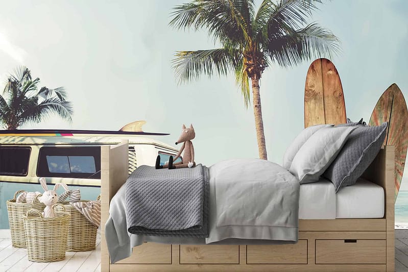 The wallpaper features a serene beach-themed backdrop with vibrant palm trees, colorful surfboards, and a retro surf van. The color palette includes shades of turquoise, sandy beige, sunny yellow, and soft coral. Elements to include are the palm trees swaying with green foliage, classic wooden surfboards in various hues leaning on the surf van that captures the vintage vibe of a cozy surf shop setting.