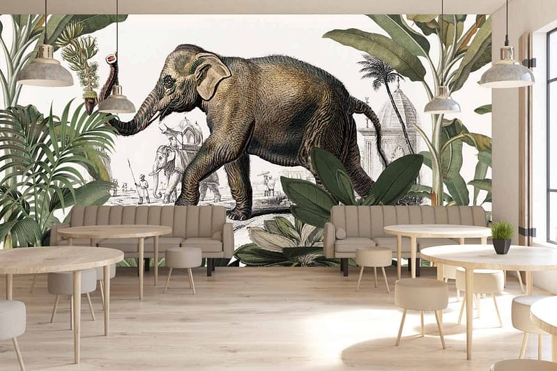 The Troupe's wallpaper features a large, detailed mural of an elephant surrounded by tropical plants. The mural incorporates traditional elements and vibrant colors like green, brown, and muted tones to create a natural ambiance.