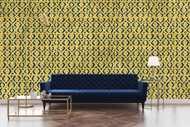 The wallpaper showcases vibrant yellow and blue geometric patterns, creating a lively backdrop for the living room.