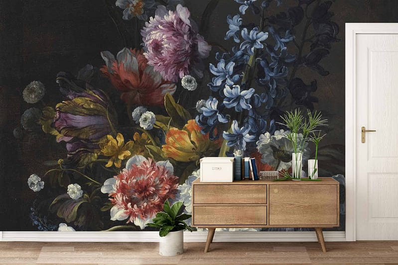 Dark floral mural wallpaper features intricate patterns of deep blue roses, rich burgundy peonies, and lush green leaves, accented by subtle gold vines. Perfect for adding a touch of elegance and calm atmosphere to the room.