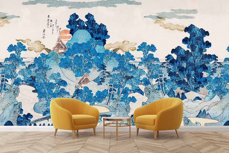 Traditional-style mural with detailed blue-hued trees, houses, and a sun partially covered by clouds. The wallpaper has intricate elements and predominantly features shades of blue.