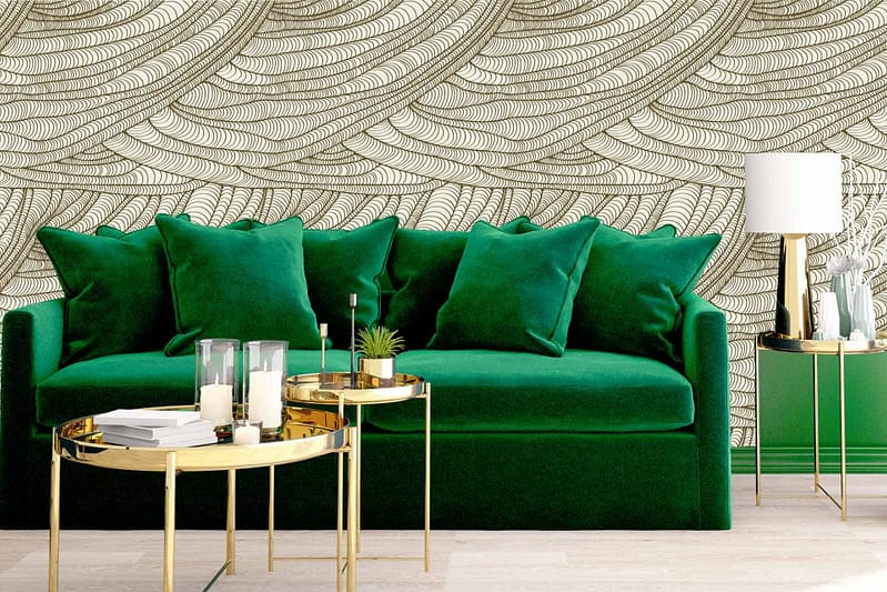 Where the Wind Goes" wallpaper features flowing, curved lines in shades of soft cream and gold. The intricate pattern includes hints of sage green and subtle touches of beige, creating a harmonious and modern backdrop that perfectly complements the living room's decor.