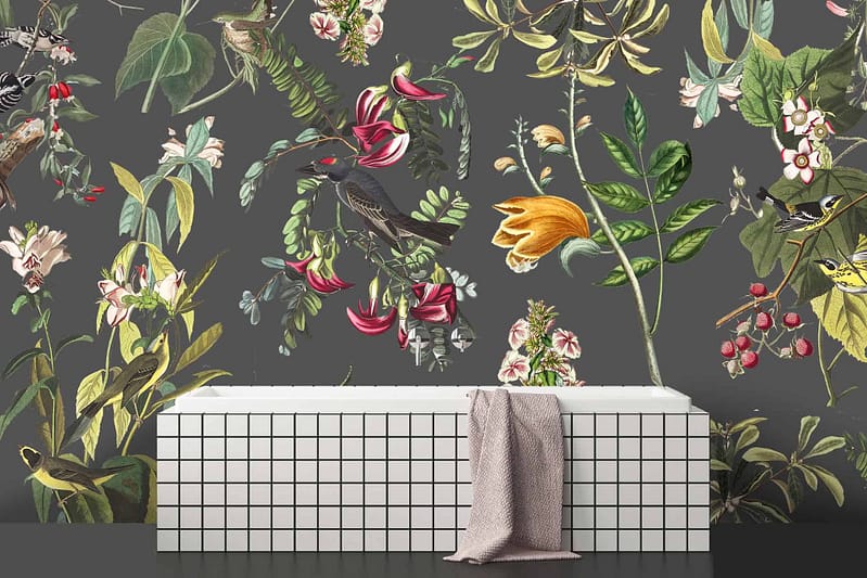 The wallpaper, inspired by the World of Birds, showcases a lush botanical theme with detailed illustrations of flowers, birds, and foliage. Colors found include rich greens from the foliage, vibrant reds and pinks from the flowers, and varied hues in bird plumage like blues, yellows, and browns.