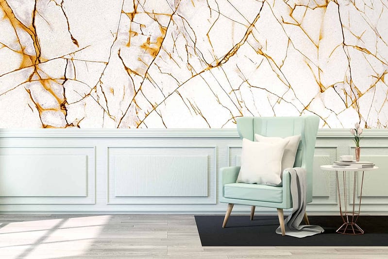 The wallpaper features a striking white and gold marble pattern.