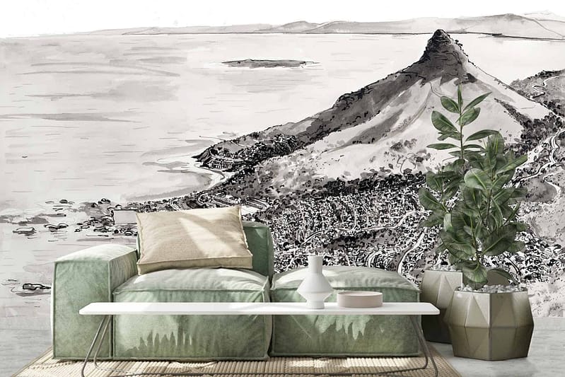 Grayscale mural of Camps Bay's coastal landscape, featuring a prominent mountain and sea.