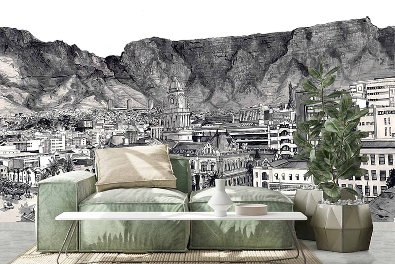 A monochrome mural wallpaper depicting a detailed cityscape with towering mountains in the background. The design blends urban elements with natural landscapes, featuring shades of grey to create a grand and intricate backdrop.