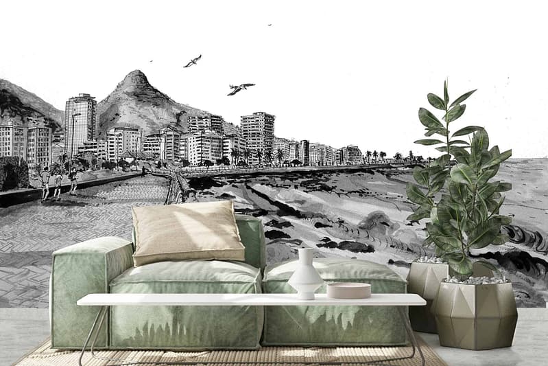 Wallpaper features: black and white mural of Sea Point's coastal cityscape, tall buildings, mountains, seagulls flying above the promenade.