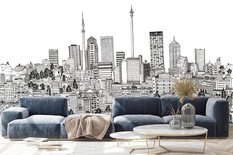 The wallpaper features a black and white mural of the City of Gold's intricate cityscape, depicting numerous buildings and landmarks. Key elements include detailed architecture and urban structures predominantly in shades of black, white, and gray.