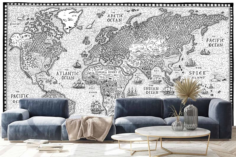 The living room features a large world map tapestry on the wall, depicting continents and oceans with illustrated details in black and white.
