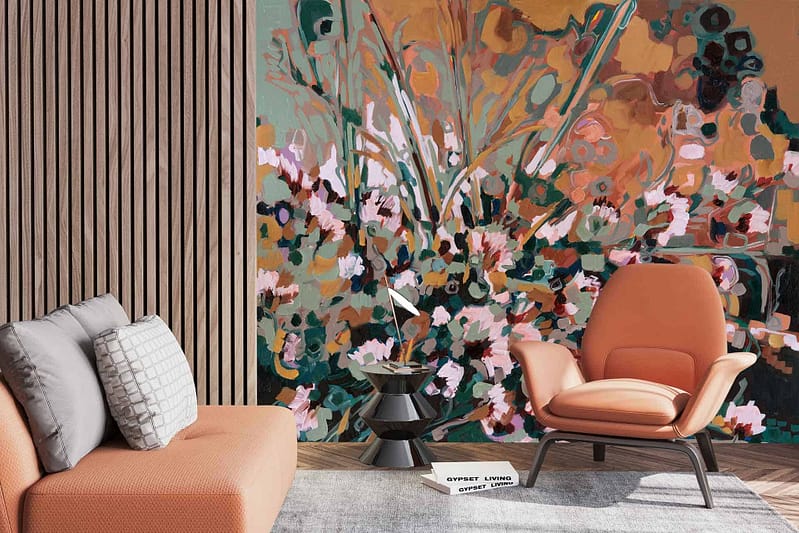 The wallpaper features vibrant floral elements, including subtle depictions of Helichrysum Italicum and Erica, in earthy tones and pink shades.