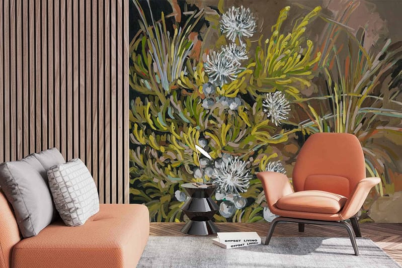 The wallpaper features a stunning nature-themed mural showcasing green and silver botanical elements, including leaves and vines. The rich green hues contrast beautifully with the sleek, metallic silver details, creating a vibrant yet elegant ambiance. These botanical patterns contribute to a serene and sophisticated atmosphere in the living room.