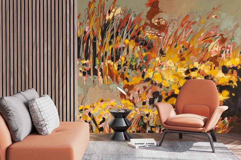 The wallpaper features an abstract floral mural with vibrant yellows, oranges, and greens.