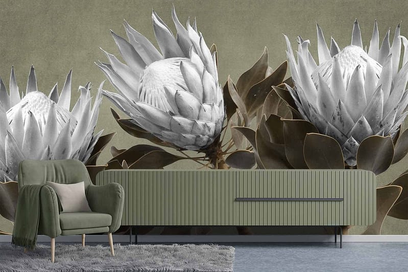The wallpaper features a large mural of three white protea flowers on a muted green background. Elements include white protea flowers and a muted green wall.