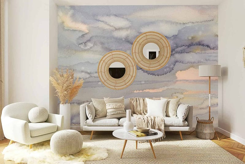 The modern living room features a stunning pastel watercolor wall mural. The mural displays soft hues of blush pink, serene blue, gentle lavender, and muted mint green. Light brush strokes and blending create an ethereal, dreamy effect. Highlighted by shades of peach and hints of gold accents that add warmth and elegance. The entirety is reminiscent of a delicate sunrise over a misty landscape with subtle texture variations adding depth to the scene.

Key elements: pastel watercolor wall mural, blush pink, serene blue, gentle lavender, muted mint green, light brush strokes, peach highlights, gold accents.