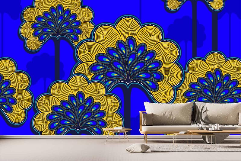 Living room wall mural features intricate pattern of stylized yellow flowers with blue accents on a bold blue background.