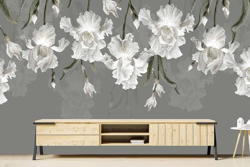 The wallpaper features a large, detailed mural of white irises on a muted gray background.