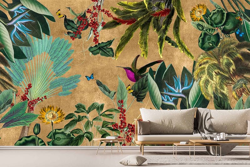 The wallpaper features a vibrant tropical-themed mural with colorful birds, butterflies, various tropical plants, and flowers against a golden background. The birds exhibit hues of blue, red, and green, while the butterflies add splashes of orange and yellow. The lush plants and flowers are depicted in rich greens with pops of bright pinks and purples.