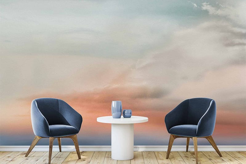 Wallpaper features a calming sky mural with soft clouds and a gradient from orange to blue.