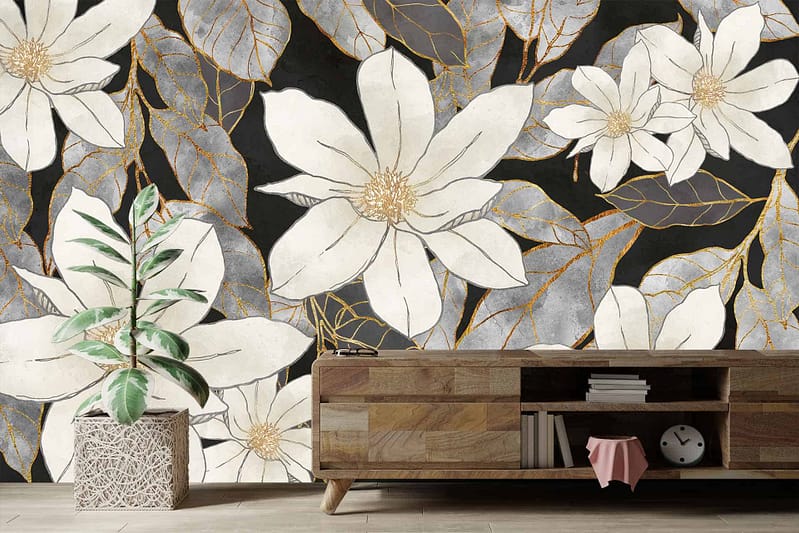 A striking large floral mural featuring white flowers, gold accents, and gray leaves on a black background. The design highlights elegant blooms with metallic touches and muted foliage against a dark backdrop.