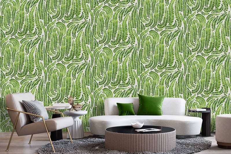 A modern living room features a green leaf-patterned wallpaper. The wallpaper boasts various shades of green leaves, intricately designed with veins and a natural texture. Key elements include large tropical leaves and delicate fern fronds, creating a lush, vibrant backdrop.