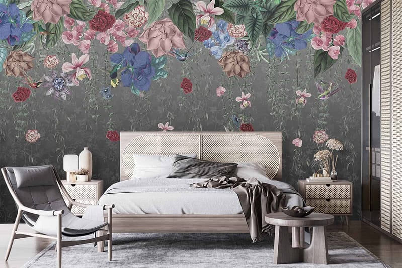 The wallpaper features a dark background adorned with large, colorful flowers. The floral design includes vibrant hues of red, pink, orange, and green foliage. It's a bold and eye-catching element in the room.