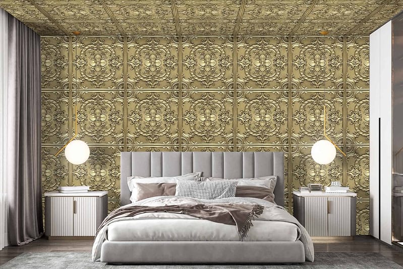 The bedroom features decorative wallpaper with an intricate gold-patterned design on both the wall and ceiling. The pattern includes rich, golden hues that create a luxurious and elegant backdrop for the room. The shimmering gold accents catch light beautifully, adding depth and sophistication to the space.
