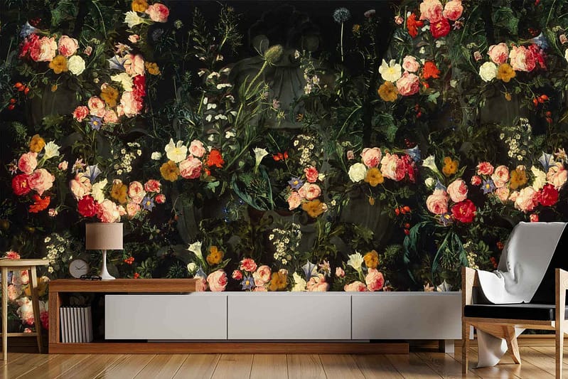 The wallpaper features an elaborate dark floral pattern, with rich, vibrant flowers in shades of deep red, purple, and green foliage. The dark background enhances the striking colors of the blooms and makes them stand out vividly.