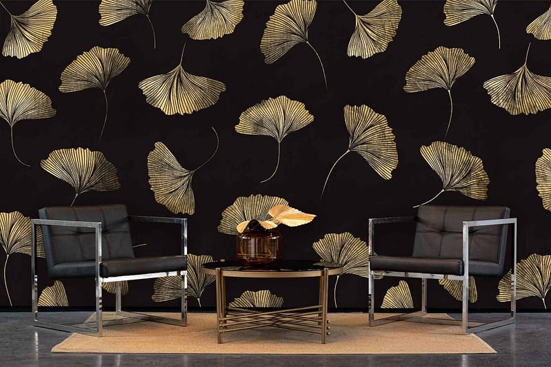 Stylish wallpaper with a black background and intricate, metallic gold ginkgo leaf pattern. Key elements: black backdrop, gold ginkgo leaves.