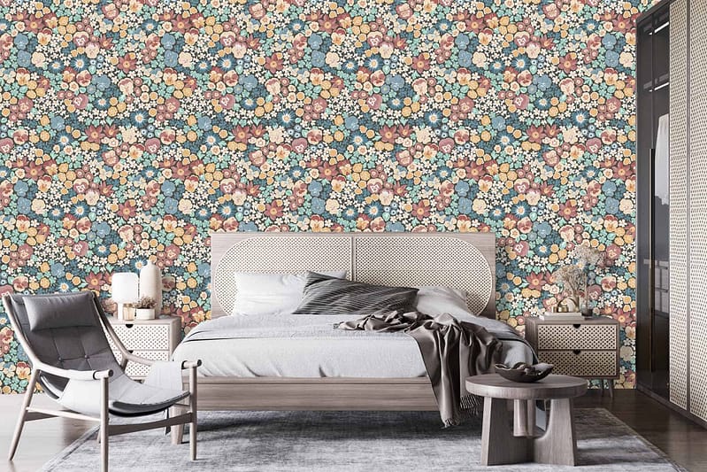 Vibrant floral wallpaper featuring orange, blue, and cream tones.