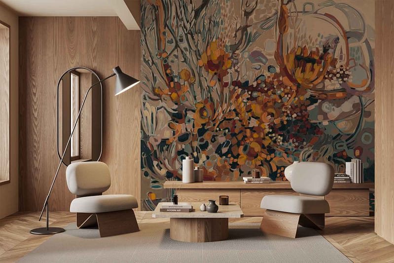 The wallpaper features a large, colorful abstract mural inspired by "After the Fire." It includes vibrant hues of red, orange, blue, and yellow with dynamic brushstrokes and intricate patterns. The overall design evokes movement and energy, perfectly complementing the warm wooden walls and floors.