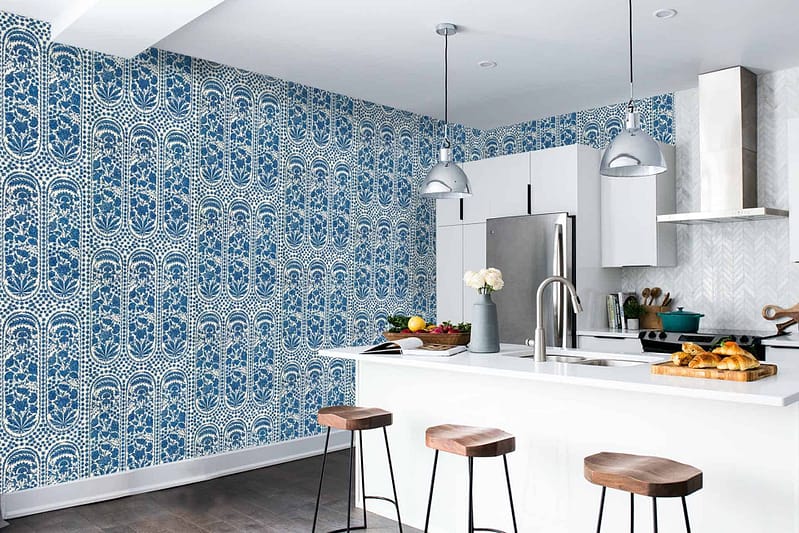The kitchen's standout element is its Blue Yonder and white patterned wallpaper. The design features a rich Blue Yonder hue intertwined with crisp white, creating an eye-catching contrast. This wallpaper brings a modern touch to one wall, integrating seamlessly with the decor and adding depth to the overall aesthetic.