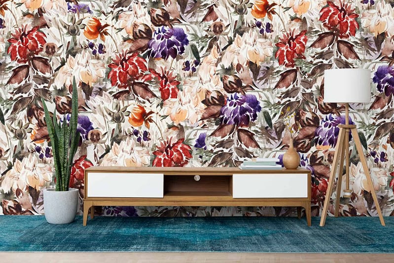 The wallpaper features vibrant floral patterns with red, orange, purple, and white flowers.
