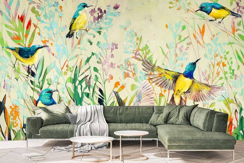 The wallpaper features a vibrant mural of birds, foliage, and blossoms with hues of blue, yellow, and green. It adds a whimsical, nature-inspired aesthetic to the room.