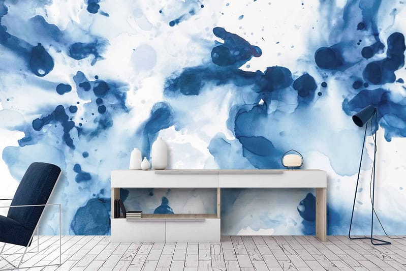 Striking blue and white abstract wall mural, resembling watercolor splashes.