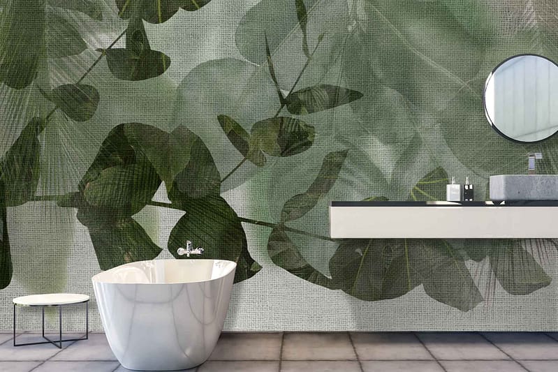 The wallpaper features a large green leaf-patterned mural. It showcases vibrant shades of green with intricate leaf designs, adding a touch of nature and creating a calming ambiance. The focus on natural elements and lush greenery provides a serene backdrop for the modern bathroom.