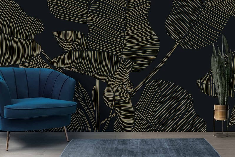 Dark wall with a bold gold leaf pattern
