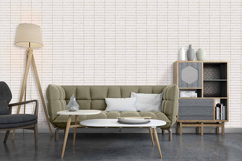 The wallpaper features a subtle geometric pattern in shades of light grey and soft white. It adds a modern yet understated elegance to the room, perfectly complementing the beige and white tones found in the furniture.